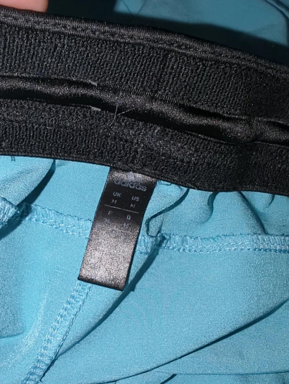 Adidas Men's Aeroready Axis Woven Training Shorts in a light blue colorway.